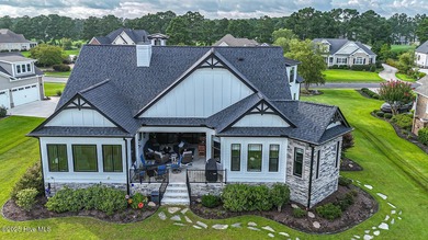 INCREDIBLE CURB APPEAL and stunning green-to-tee views of the #1 on Crow Creek Golf Club in North Carolina - for sale on GolfHomes.com, golf home, golf lot