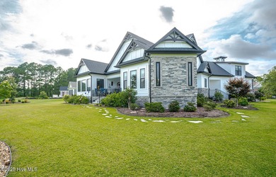 INCREDIBLE CURB APPEAL and stunning green-to-tee views of the #1 on Crow Creek Golf Club in North Carolina - for sale on GolfHomes.com, golf home, golf lot
