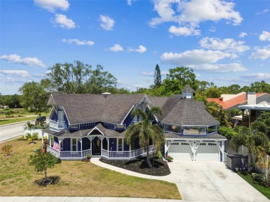 Nestled on a beautifully positioned corner lot directly across on Clearwater Country Club in Florida - for sale on GolfHomes.com, golf home, golf lot