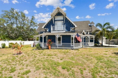 Nestled on a beautifully positioned corner lot directly across on Clearwater Country Club in Florida - for sale on GolfHomes.com, golf home, golf lot