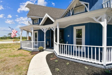 Nestled on a beautifully positioned corner lot directly across on Clearwater Country Club in Florida - for sale on GolfHomes.com, golf home, golf lot