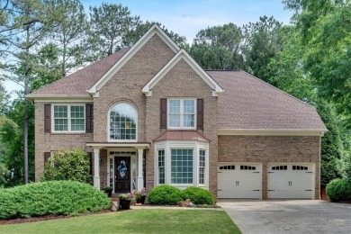 Welcome to this stunning 5 Bedroom/4 Bath Executive Residence on Towne Lake Hills Golf Club in Georgia - for sale on GolfHomes.com, golf home, golf lot