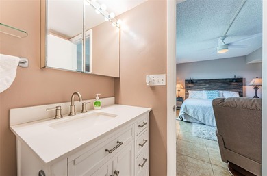 Welcome to this beautifully maintained turnkey 2-bedroom on Isla Del Sol Yacht and Country Club in Florida - for sale on GolfHomes.com, golf home, golf lot