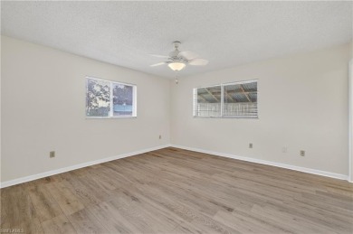 Welcome to this beautifully maintained 3-bedroom, 2-bathroom on San Carlos Golf Club in Florida - for sale on GolfHomes.com, golf home, golf lot