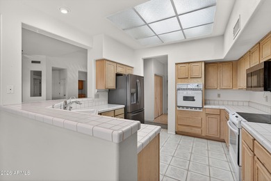 Located on the 12th hole of the Echo Mesa Golf Course, this on Echo Mesa Golf Course in Arizona - for sale on GolfHomes.com, golf home, golf lot