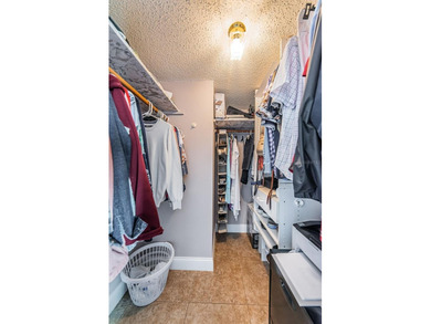 Welcome to this beautifully maintained turnkey 2-bedroom on Isla Del Sol Yacht and Country Club in Florida - for sale on GolfHomes.com, golf home, golf lot