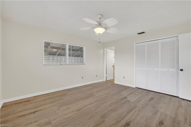 Welcome to this beautifully maintained 3-bedroom, 2-bathroom on San Carlos Golf Club in Florida - for sale on GolfHomes.com, golf home, golf lot