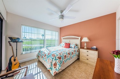 Welcome to this beautifully maintained turnkey 2-bedroom on Isla Del Sol Yacht and Country Club in Florida - for sale on GolfHomes.com, golf home, golf lot