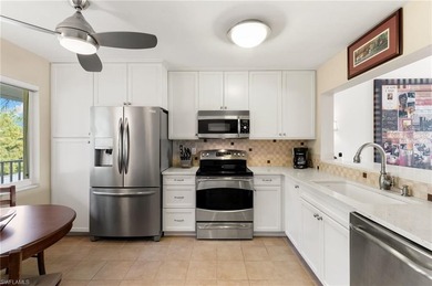 Rarely Available Top-Floor End Unit with Stunning Lake & Golf on Royal Wood Golf and Country Club in Florida - for sale on GolfHomes.com, golf home, golf lot