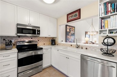 Rarely Available Top-Floor End Unit with Stunning Lake & Golf on Royal Wood Golf and Country Club in Florida - for sale on GolfHomes.com, golf home, golf lot