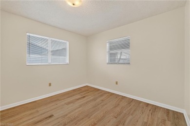 Welcome to this beautifully maintained 3-bedroom, 2-bathroom on San Carlos Golf Club in Florida - for sale on GolfHomes.com, golf home, golf lot
