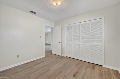 Welcome to this beautifully maintained 3-bedroom, 2-bathroom on San Carlos Golf Club in Florida - for sale on GolfHomes.com, golf home, golf lot