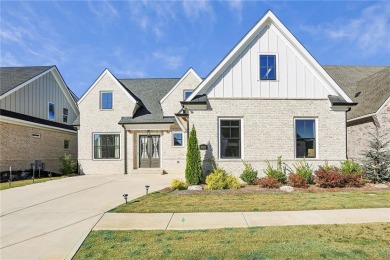 Located in the Brookstone Village at Chateau Elan, this like-new on Chateau Elan Golf Club  in Georgia - for sale on GolfHomes.com, golf home, golf lot