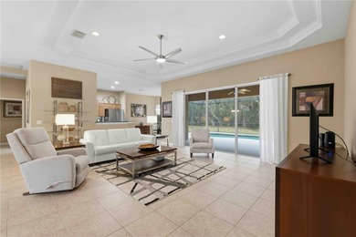 Welcome to this Beautifully Appointed Pool home in Gated on Stoneybrook Golf Club At Heritage Harbour in Florida - for sale on GolfHomes.com, golf home, golf lot