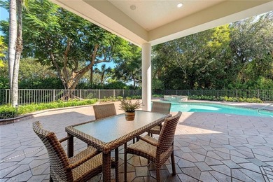 Tucked away on a quiet, tree-lined street in the exclusive on Colliers Reserve Country Club in Florida - for sale on GolfHomes.com, golf home, golf lot