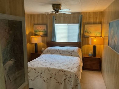 TIRED OF SNOW,ICE AND COLD, TRADE IT IN FOR SUN,WARM AND WHITE on Pine Lakes Country Club in Florida - for sale on GolfHomes.com, golf home, golf lot