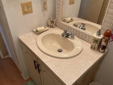 TIRED OF SNOW,ICE AND COLD, TRADE IT IN FOR SUN,WARM AND WHITE on Pine Lakes Country Club in Florida - for sale on GolfHomes.com, golf home, golf lot