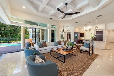 Tucked away on a quiet, tree-lined street in the exclusive on Colliers Reserve Country Club in Florida - for sale on GolfHomes.com, golf home, golf lot