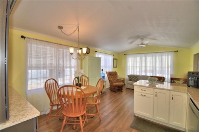 WELCOME TO YOUR FLORIDA RETIREMENT OASIS OR FULL-TIME LIVING on Southern Dunes Golf and Country Club in Florida - for sale on GolfHomes.com, golf home, golf lot