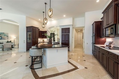 Tucked away on a quiet, tree-lined street in the exclusive on Colliers Reserve Country Club in Florida - for sale on GolfHomes.com, golf home, golf lot