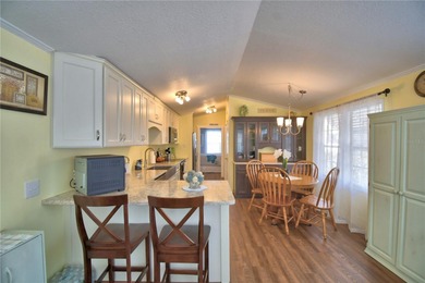 WELCOME TO YOUR FLORIDA RETIREMENT OASIS OR FULL-TIME LIVING on Southern Dunes Golf and Country Club in Florida - for sale on GolfHomes.com, golf home, golf lot