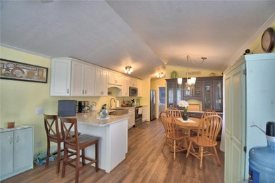 WELCOME TO YOUR FLORIDA RETIREMENT OASIS OR FULL-TIME LIVING on Southern Dunes Golf and Country Club in Florida - for sale on GolfHomes.com, golf home, golf lot