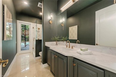 Tucked away on a quiet, tree-lined street in the exclusive on Colliers Reserve Country Club in Florida - for sale on GolfHomes.com, golf home, golf lot