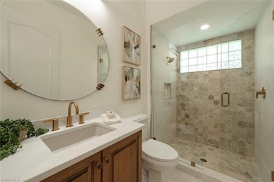 Tucked away on a quiet, tree-lined street in the exclusive on Colliers Reserve Country Club in Florida - for sale on GolfHomes.com, golf home, golf lot