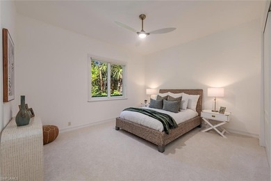 Tucked away on a quiet, tree-lined street in the exclusive on Colliers Reserve Country Club in Florida - for sale on GolfHomes.com, golf home, golf lot