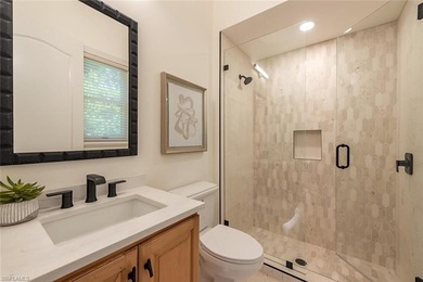 Tucked away on a quiet, tree-lined street in the exclusive on Colliers Reserve Country Club in Florida - for sale on GolfHomes.com, golf home, golf lot