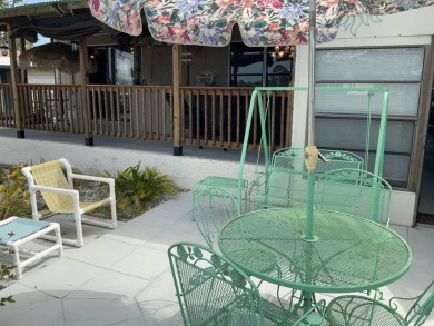 TIRED OF SNOW,ICE AND COLD, TRADE IT IN FOR SUN,WARM AND WHITE on Pine Lakes Country Club in Florida - for sale on GolfHomes.com, golf home, golf lot
