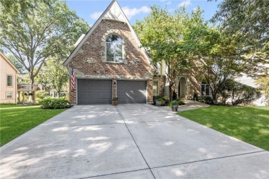Discover a distinguished Tudor-style home by builder Jim Lambie on Leawood South Country Club in Kansas - for sale on GolfHomes.com, golf home, golf lot