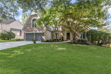 Discover a distinguished Tudor-style home by builder Jim Lambie on Leawood South Country Club in Kansas - for sale on GolfHomes.com, golf home, golf lot