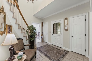 Discover a distinguished Tudor-style home by builder Jim Lambie on Leawood South Country Club in Kansas - for sale on GolfHomes.com, golf home, golf lot