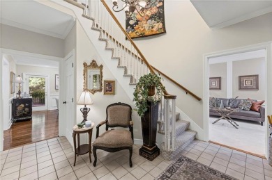 Discover a distinguished Tudor-style home by builder Jim Lambie on Leawood South Country Club in Kansas - for sale on GolfHomes.com, golf home, golf lot