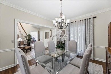 Discover a distinguished Tudor-style home by builder Jim Lambie on Leawood South Country Club in Kansas - for sale on GolfHomes.com, golf home, golf lot