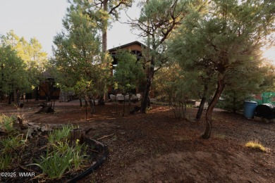 Nestled among the tall pines on the 8th fairway of Torreon's on Torreon Golf Club in Arizona - for sale on GolfHomes.com, golf home, golf lot