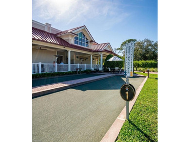 Tucked away on a quiet, tree-lined street in the exclusive on Colliers Reserve Country Club in Florida - for sale on GolfHomes.com, golf home, golf lot