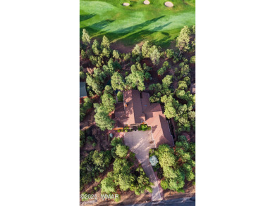 Nestled among the tall pines on the 8th fairway of Torreon's on Torreon Golf Club in Arizona - for sale on GolfHomes.com, golf home, golf lot