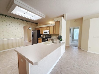 Welcome to this beautifully updated St. Clair model, perfectly on Kings Ridge Golf Club in Florida - for sale on GolfHomes.com, golf home, golf lot