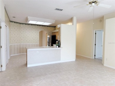 Welcome to this beautifully updated St. Clair model, perfectly on Kings Ridge Golf Club in Florida - for sale on GolfHomes.com, golf home, golf lot