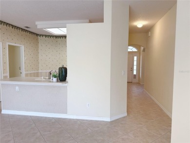 Welcome to this beautifully updated St. Clair model, perfectly on Kings Ridge Golf Club in Florida - for sale on GolfHomes.com, golf home, golf lot