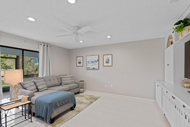 GORGEOUS WATERFRONT CONDO | COMPLETELY REMODELED | FIRST FLOOR on Boca Lago Golf and Country Club in Florida - for sale on GolfHomes.com, golf home, golf lot