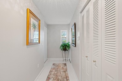 GORGEOUS WATERFRONT CONDO | COMPLETELY REMODELED | FIRST FLOOR on Boca Lago Golf and Country Club in Florida - for sale on GolfHomes.com, golf home, golf lot