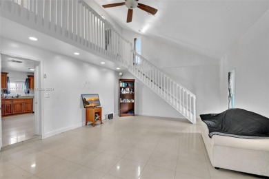 Enjoy this 2-story home built in 2015. No HOA Community. This on Trump International Golf Club West Palm Beach in Florida - for sale on GolfHomes.com, golf home, golf lot