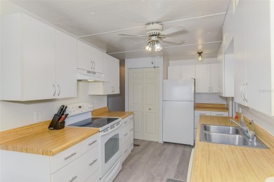 One or more photo(s) has been virtually staged. SELLER FINANCING on Sabal Trace Golf and Country Club in Florida - for sale on GolfHomes.com, golf home, golf lot