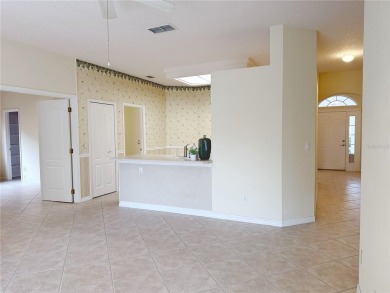 Welcome to this beautifully updated St. Clair model, perfectly on Kings Ridge Golf Club in Florida - for sale on GolfHomes.com, golf home, golf lot
