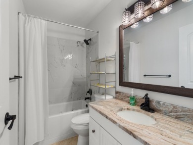Welcome to this beautifully renovated, turn key, first-floor on The American Golf Club in Florida - for sale on GolfHomes.com, golf home, golf lot