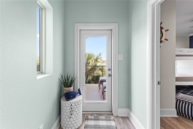 Nestled among palms on Island Moorings' coveted *Shady Side,* on Palmilla Beach Golf Club in Texas - for sale on GolfHomes.com, golf home, golf lot