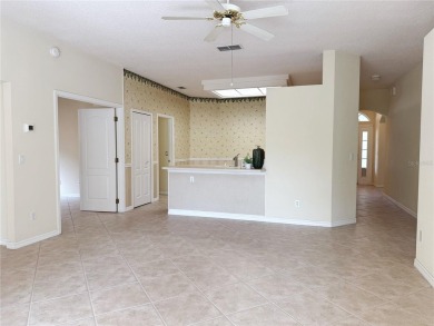 Welcome to this beautifully updated St. Clair model, perfectly on Kings Ridge Golf Club in Florida - for sale on GolfHomes.com, golf home, golf lot